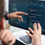 Two men working in AI-software testing